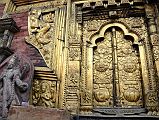 Kathmandu Changu Narayan 19 Gilded Window And Ornate Carvings On Left Side Of Main Entrance To Changu Narayan Temple
